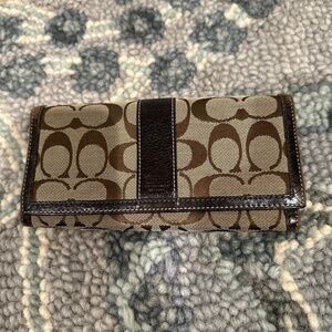 brown medium size coach wallet